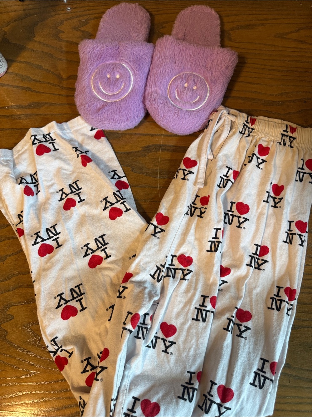 Woman’s Pajama Pants in White with purple slippers